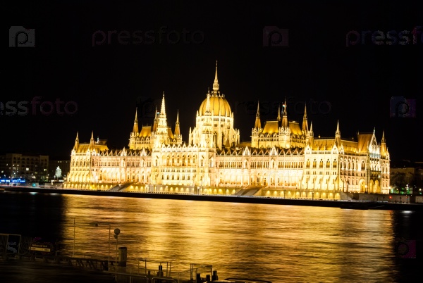 The Hungarian Parliament Building with bright and beautiful illumination at night. It is the seat of the National Assembly of Hungary, one of Europe\'s oldest legislative buildings
