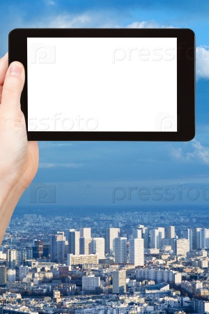 smartphone with cut out screen and urban landscape