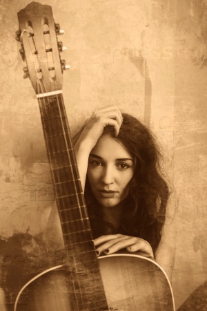 retro sepia beautiful young adult nude woman holding an acoustic guitar art vintage photo