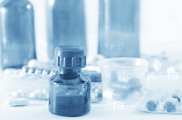 Color pills and medical bottle, stock photo