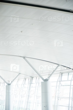 Blurred photo of an airport terminal.