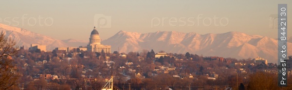 Salt Lake City with the Wasatch Mountain Range showing through the pollution