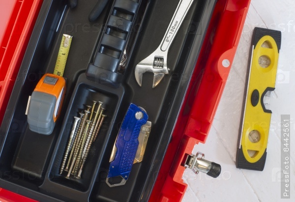 Orange Tool Box with Crescent Measuring Tape Level Boxcutter Screws and Multi Purpose Tool