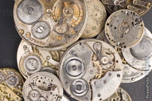 Macro Image Pile of Vintage Pocket Watches Jewels and Gears Silver Gold