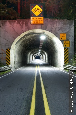 Long Dark Tunnel on Highway 101 Two Lane Road in Oregon State West Coast Pacific Hiway