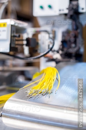 Image of crimped wires on machine
