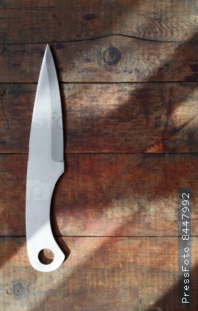 Knife On Wood