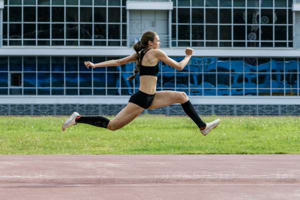 girl athlete execution of the triple jump