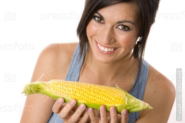 A Beautiful Brunette holds a corn stalk