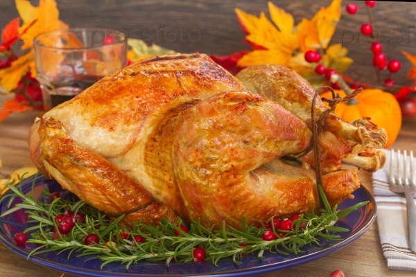 Thnaksgiving dish - turkey with pumpkins and fall leaves