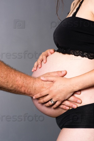 Man Woman Partners Expecting Baby Both Touch Hands Pregnant