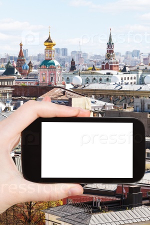 smartphone with cut out screen and Moscow center