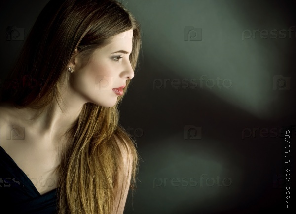 Profile side portrait of beautiful young woman