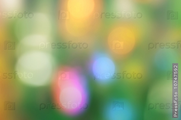 Abstract blurred defocused effect bokeh with green, blue, pink, orange and other colors