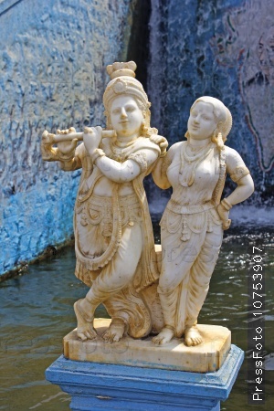 FEBRUARY 21, 2014, KRISHNARAJSAGAR, KARNATAKA, INDIA - Sculpture of Shri Radha and Krishna in the  Brindaban Gardens at the Krishnarajsagar Hydro Power Station