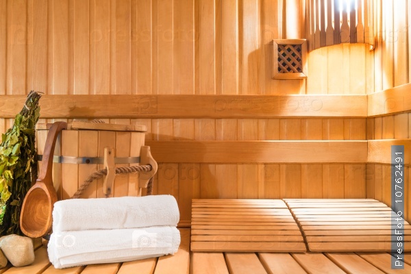 Steam room made of natural wood and accessories, stock photo