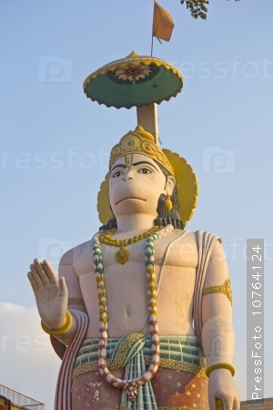 FEBRUARY 27, 2014, VRINDAVAN, UTTAR-PRADESH, INDIA - Giant sculpture of the god Hanuman close to temple
