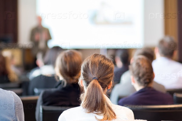 Speaker Giving a Talk at Business Meeting. Audience in the conference hall. Business and Entrepreneurship. , stock photo