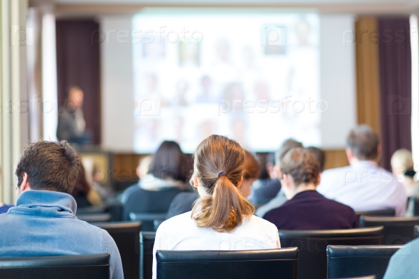 Speaker Giving a Talk at Business Meeting. Audience in the conference hall. Business and Entrepreneurship. , stock photo