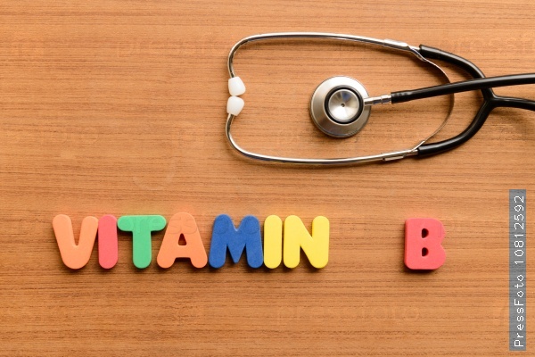 vitamin B  colorful word on the wooden background