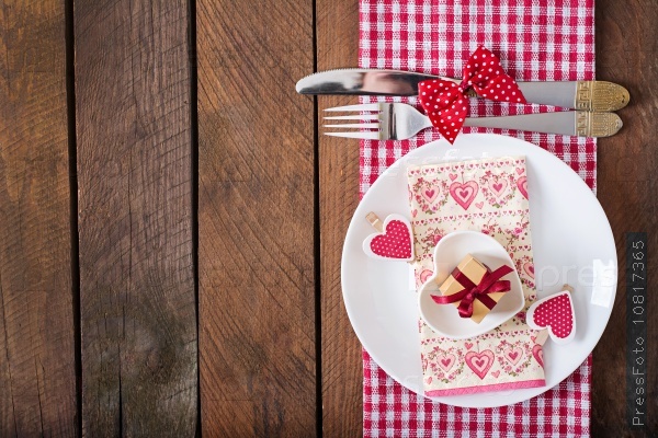 Romantic table setting for Valentines day in a rustic style. Top view, stock photo