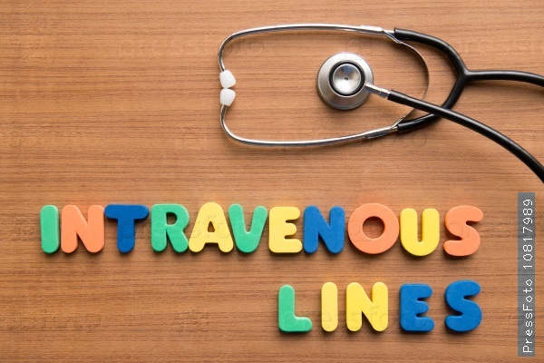 Intravenous (IV) lines colorful word with stethoscope on the wooden background