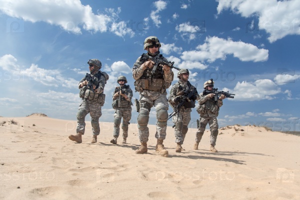 United States paratroopers airborne infantrymen in action in the desert