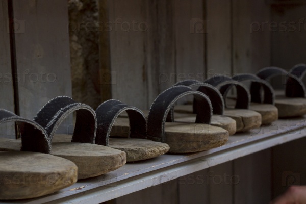 Special footwear - Slippers to visit the mosque in Alanya, Turkey, stock photo