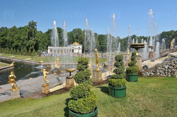 views of the sea channel and the cascade of fountains in Peterhof, Russia