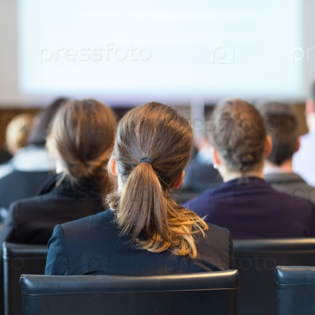 Speaker Giving a Talk at Business Meeting. Audience in the conference hall. Business and Entrepreneurship. Square composition, stock photo