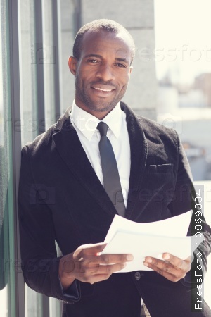 portrait of happy black man in business attire