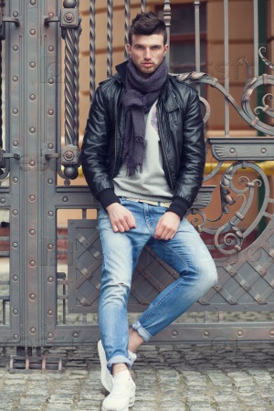 Fashionable man posing in old city