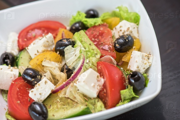 Greek salad (feta cheese, olive and vegetables), stock photo