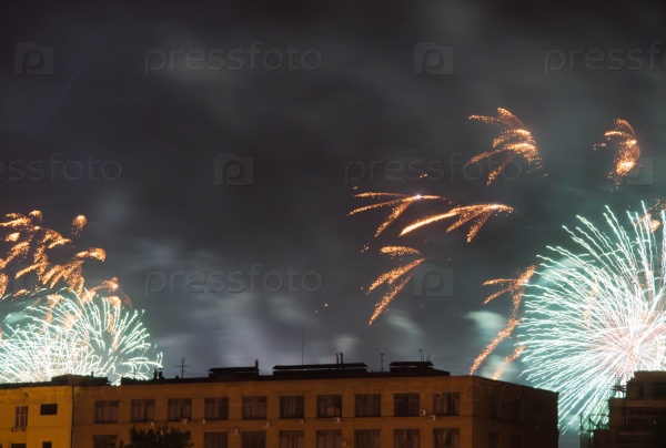 Fireworks on the background of the building in the night sky, stock photo