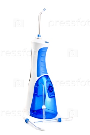 Oral irrigator with four replaceable jet tips