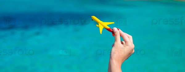 Small plane on background of turquoise sea