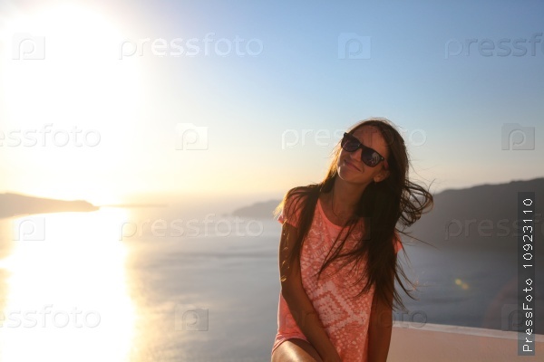 Beautiful young woman in greek town. Greece, stock photo