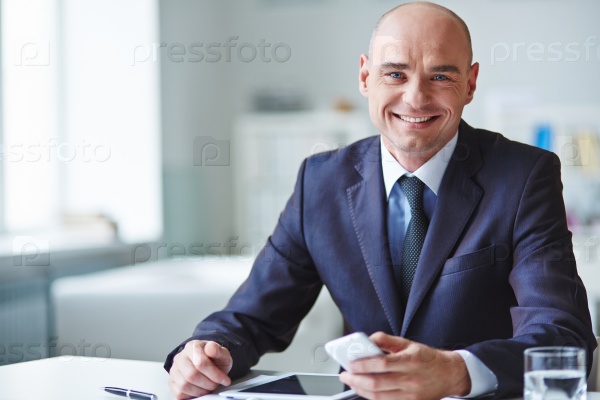 Portrait of a ceo looking at camera and smiling, stock photo