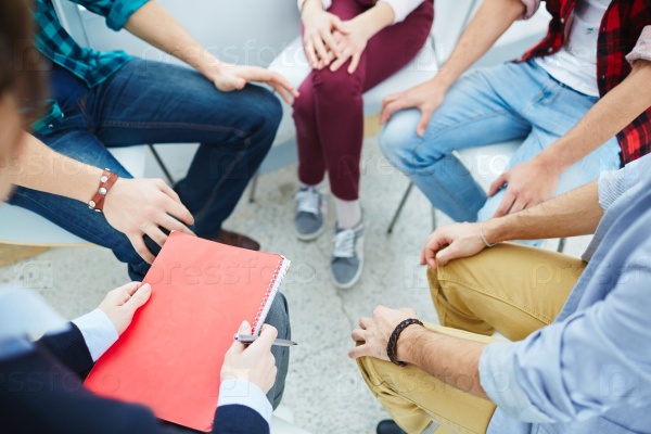Group of people visiting course of psychological therapy, stock photo