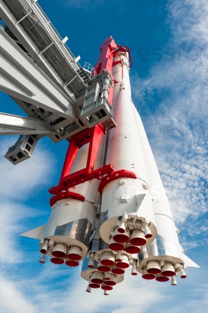 space rocket on the launch pad on a background of blue sky