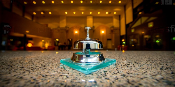 Service ring bell at the reception of a hotel, stock photo