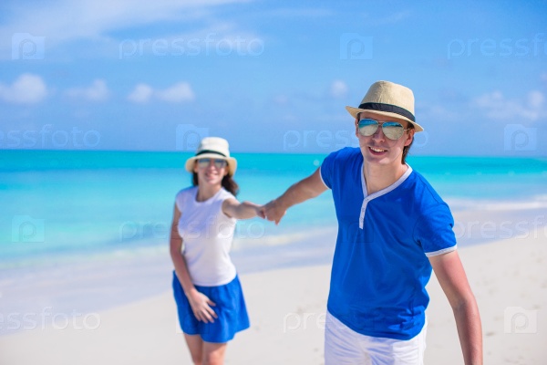 Happy family have fun on Caribbean beach vacation