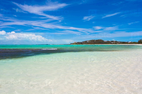 Perfect white beach with turquoise water at ideal island, stock photo