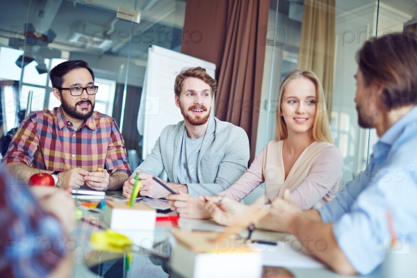 Group of business people having a meeting at office, stock photo