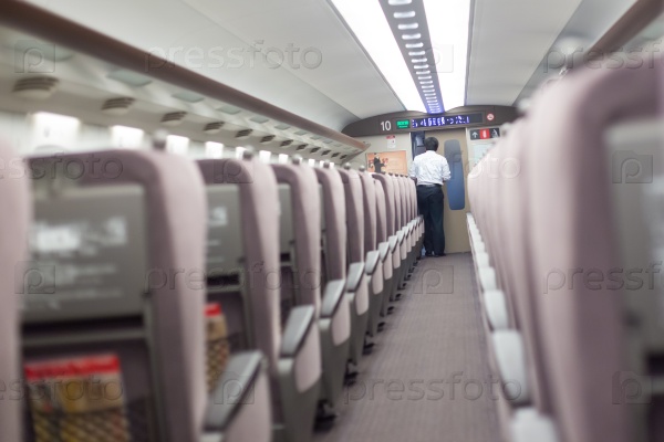 Clean interior of modern japanese fast train, stock photo