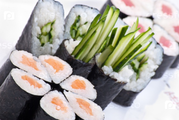 Closeup japanese sushi on a white plate. Sushi set