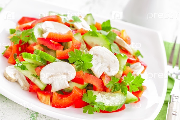 Vegetable salad with mushrooms , stock photo