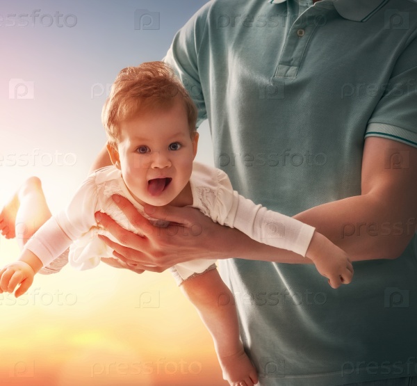 Happy loving family. Father and his daughter baby girl playing and hugging outdoors. Concept of Father\'s day, stock photo