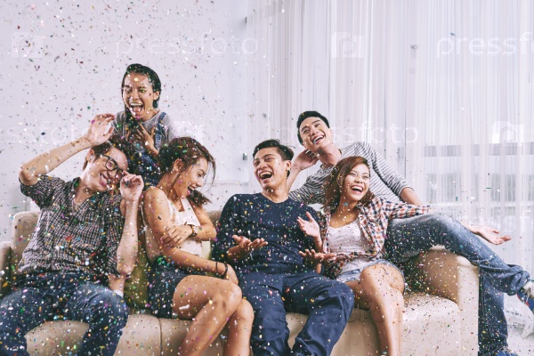 Group of Asian friends having fun at home party