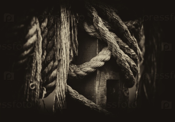 Horizontal vintage vignette sepia medieval ship ropes detail closeup bokeh background backdrop